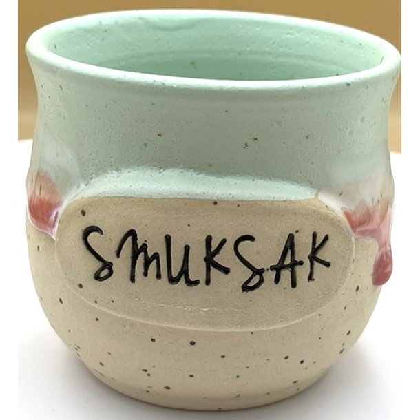 Keramik krus uden hank  lime m/r�d l�beglasur og tekst "Smuksak"