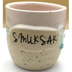 Keramik krus uden hank  pink m/gr�n l�beglasur og tekst "Smuksak"