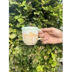 Keramik krus m/hank og citat-tekst "Er der mere kage ?"