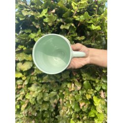 Keramik krus m/hank og citat-tekst "Er der mere kage ?"