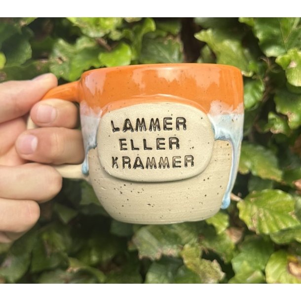 Keramik krus m/hank og citat-tekst "Lammer eller krammer"