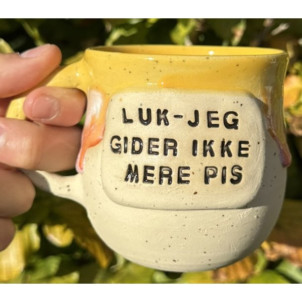 Keramik krus m/hank og citat-tekst "Luk-jeg gider ikke mere pis"
