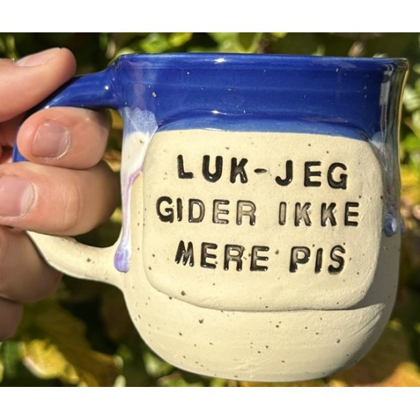 Keramik krus m/hank og citat-tekst "Luk-jeg gider ikke mere pis"