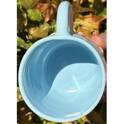 Keramik krus m/hank og citat-tekst "S snakker vi ikke mere om det"